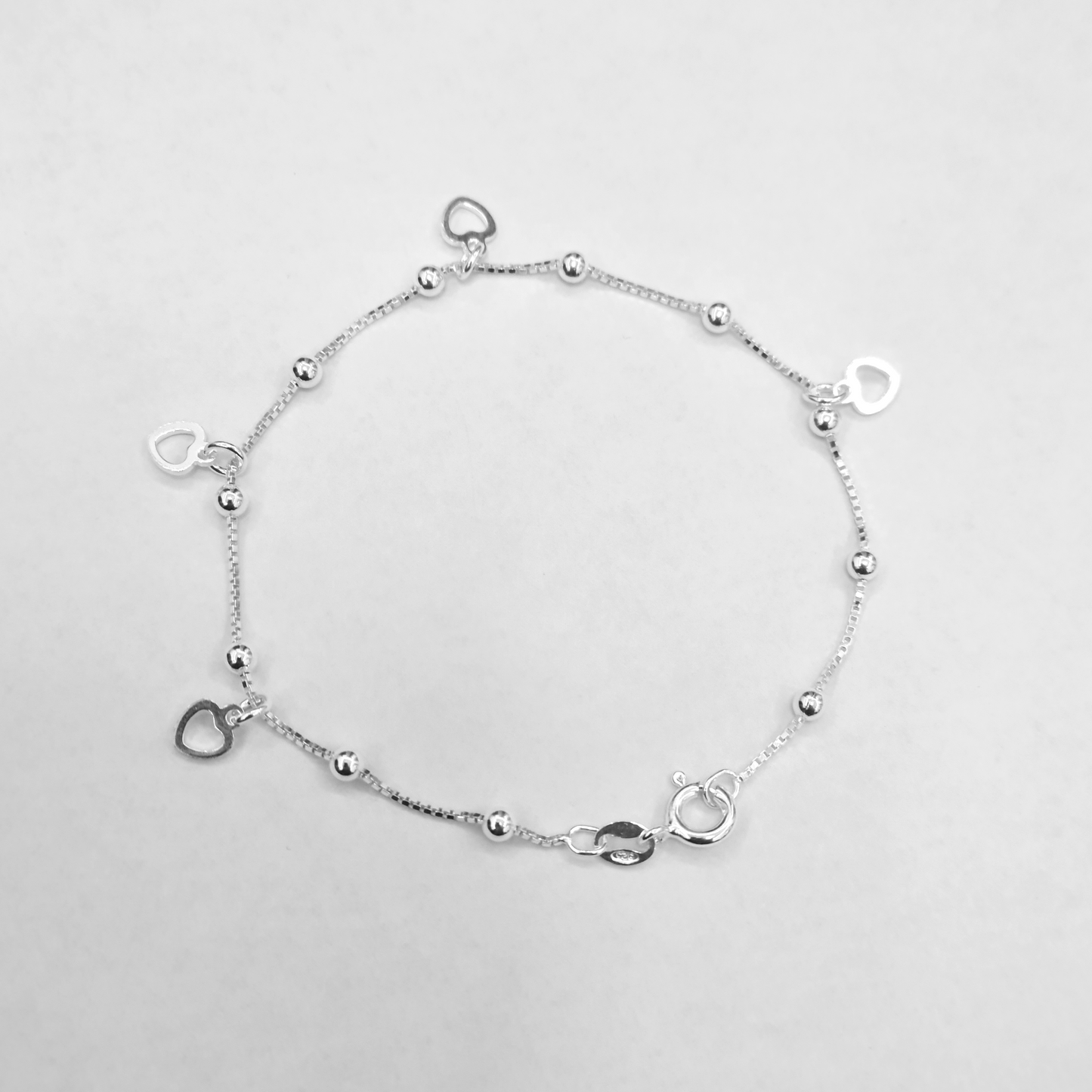 Bracciale con ciondolini a forma di cuore